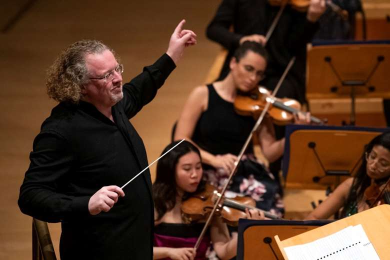 Stéphane Denève, seen here conducting NWS at its 2023 Gala, will take up his new role with a special debut concert on 8 April © Blooming Photo Co.