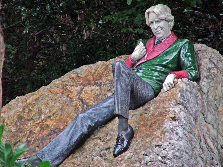 The legacy of the Irish poet is celebrated through the Oscar Wilde Memorial Sculpture in Merrion Square in Dublin, Ireland which was unveiled in 1997 ©Adobe Stock