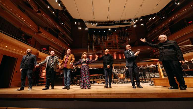 Left to right: prize-winners Yair Klartag, Juan Trigos, Jordan Nobles, Prizes founder Sharon Azrieli, prizewinner Josef Bardanashvili and conductor Andrew Megill ©Tam Photography | Danylo Bobyk