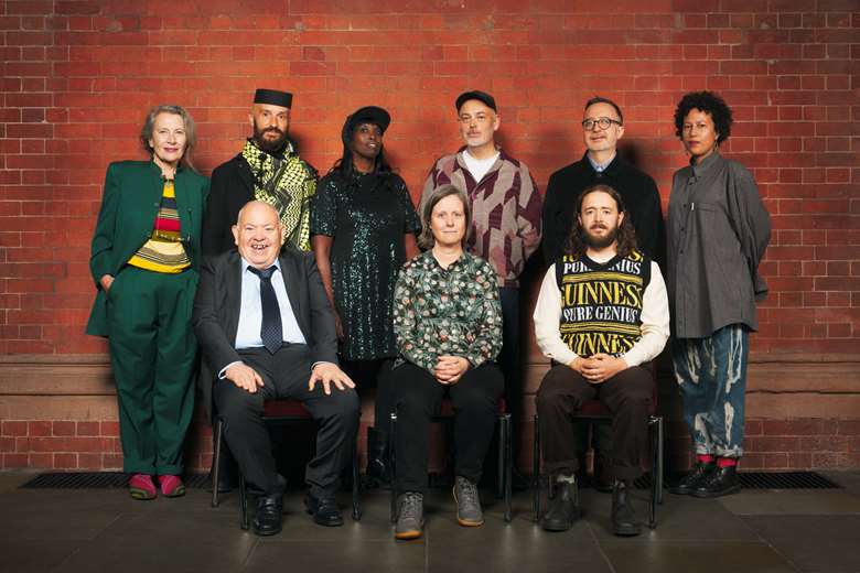 This year's Award winners: (Back row L-R) Anne Bean, Mikhail Karikis, Grace Ndiritu, Aidan O’Rourke, Andrew Hamilton, Auclair (Front L-R) Barry Anthony Finan, Rachel Musson, Sean Roy Parker ©Emile Holba